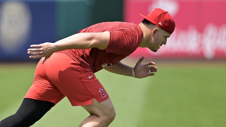 Angels right fielder Mike Trout (27) works out on the field prior to the game against the New York Yankees at Angel Stadium. Angels right fielder Mike Trout (27) works out on the field prior to the game against the New York Yankees at Angel Stadium.