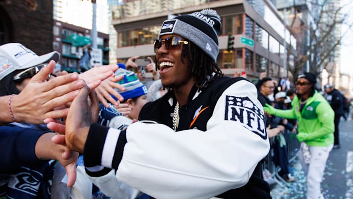 Feb 11, 2026; Seattle, WA, USA; Seattle Seahawks wide receiver Rashid Shaheed (22) high fives fans during Seattle Seahawks Super Bowl LX parade. Mandatory Credit: Kevin Ng-Imagn Images