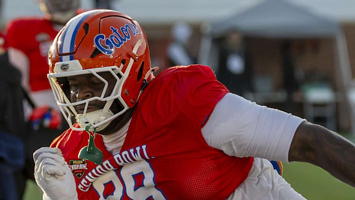 Caleb Banks of Florida works in a drill during Senior Bowl practice. Caleb Banks of Florida works in a drill during Senior Bowl practice.