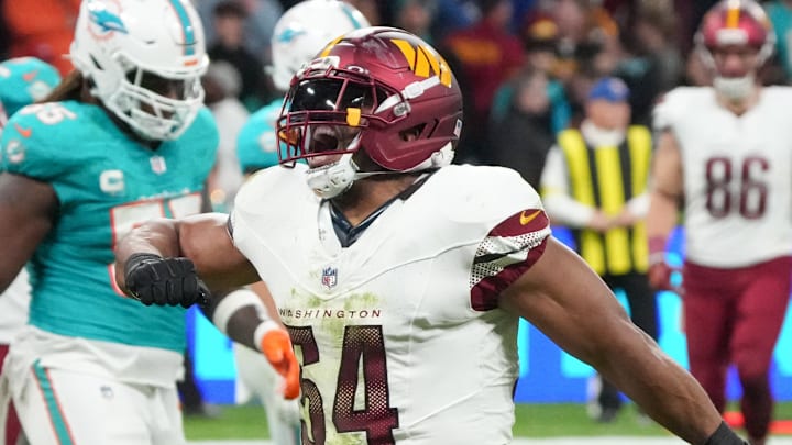 Nov 16, 2025; Madrid, Spain; Washington Commanders linebacker Bobby Wagner (54) reacts after a play against the Miami Dolphins in the fourth quarter during the 2025 NFL Madrid Game at Santiago Bernabeu Stadium. Mandatory Credit: Kirby Lee-Imagn Images