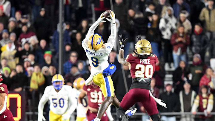 Nov 30, 2024; Chestnut Hill, Massachusetts, USA; Pittsburgh Panthers wide receiver Konata Mumpfield (9) makes a catch for a first down against the Boston College Eagles during the first half at Alumni Stadium. Mandatory Credit: Brian Fluharty-Imagn Images