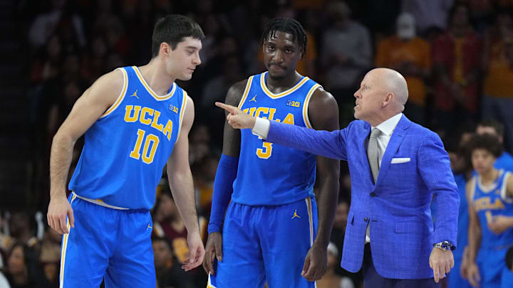Jan 27, 2025; Los Angeles, California, USA; UCLA Bruins head coach Mick Cronin talks with guard Lazar Stefanovic (10) and guard Eric Dailey Jr. (3) against the Southern California Trojans at the Galen Center. Mandatory Credit: Kirby Lee-Imagn Images Jan 27, 2025; Los Angeles, California, USA; UCLA Bruins head coach Mick Cronin talks with guard Lazar Stefanovic (10) and guard Eric Dailey Jr. (3) against the Southern California Trojans at the Galen Center. Mandatory Credit: Kirby Lee-Imagn Images
