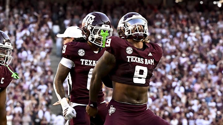 Texas A&M Aggies defensive end Cashius Howell reacts after a sack during the fourth quarter against the Auburn Tigers at Kyle Field. Texas A&M Aggies defensive end Cashius Howell reacts after a sack during the fourth quarter against the Auburn Tigers at Kyle Field.