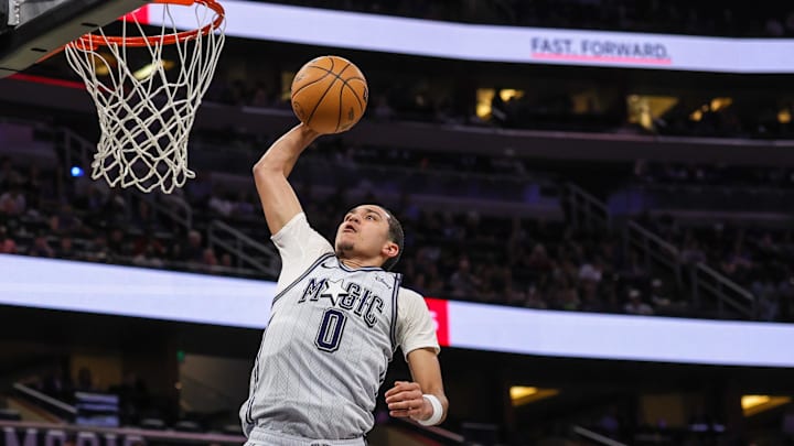 Orlando Magic guard Anthony Black (0) shoots against LA Clippers guard Bogdan Bogdanovic (10) during the second quarter at Kia Center.