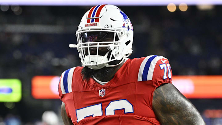 Dec 1, 2025; Foxborough, Massachusetts, USA; New England Patriots offensive tackle Morgan Moses (76) warms up prior to the game against the New York Giants at Gillette Stadium. Mandatory Credit: Eric Canha-Imagn Images