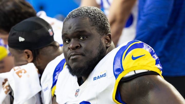 Dec 7, 2025; Glendale, Arizona, USA; Los Angeles Rams  offensive lineman Kevin Dotson (69) against the Arizona Cardinals at State Farm Stadium. Mandatory Credit: Mark J. Rebilas-Imagn Images