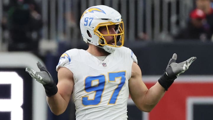 Jan 11, 2025; Houston, Texas, USA; Los Angeles Chargers outside linebacker Joey Bosa (97) reacts after sacking Houston Texans quarterback C.J. Stroud (7) (not pictured) in the first quarter in an AFC wild card game at NRG Stadium. Mandatory Credit: Thomas Shea-Imagn Images Jan 11, 2025; Houston, Texas, USA; Los Angeles Chargers outside linebacker Joey Bosa (97) reacts after sacking Houston Texans quarterback C.J. Stroud (7) (not pictured) in the first quarter in an AFC wild card game at NRG Stadium. Mandatory Credit: Thomas Shea-Imagn Images