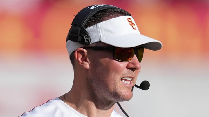 Nov 30, 2024; Los Angeles, California, USA; Southern California Trojans head coach Lincoln Riley reacts against the Notre Dame Fighting Irish in the second half at United Airlines Field at Los Angeles Memorial Coliseum. Mandatory Credit: Kirby Lee-Imagn Images