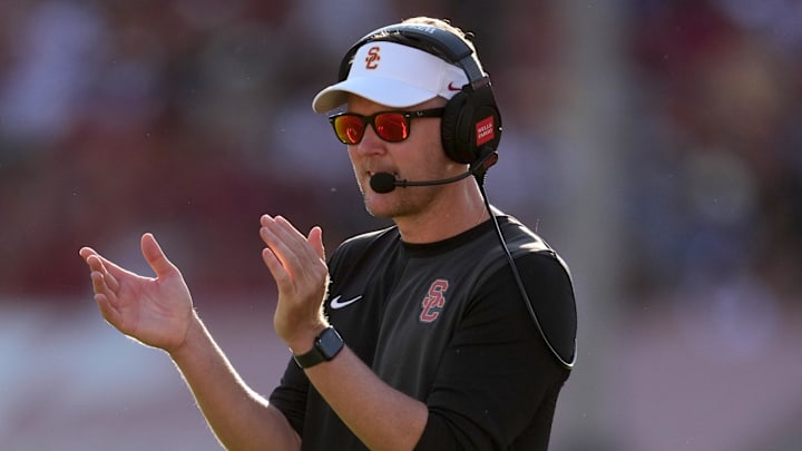 Aug 30, 2025; Los Angeles, California, USA; Southern California Trojans head coach Lincoln Riley watches from the sidelines against the Missouri State Bears in the first half at United Airlines Field at Los Angeles Memorial Coliseum. Mandatory Credit: Kirby Lee-Imagn Images