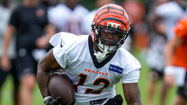 Cincinnati Bengals wide receiver Rashod Owens (12) runs with a catch during practice at the Paycor Stadium practice field in downtown Cincinnati on Wednesday, Aug. 20, 2025.