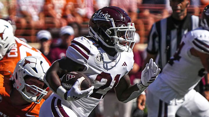 Mississippi State running back Davon Booth (21) runs the ball against the Texas Longhorns at Darrell K Royal-Texas Memorial Stadium in Austin Saturday, Sept. 28, 2024. Mississippi State running back Davon Booth (21) runs the ball against the Texas Longhorns at Darrell K Royal-Texas Memorial Stadium in Austin Saturday, Sept. 28, 2024.