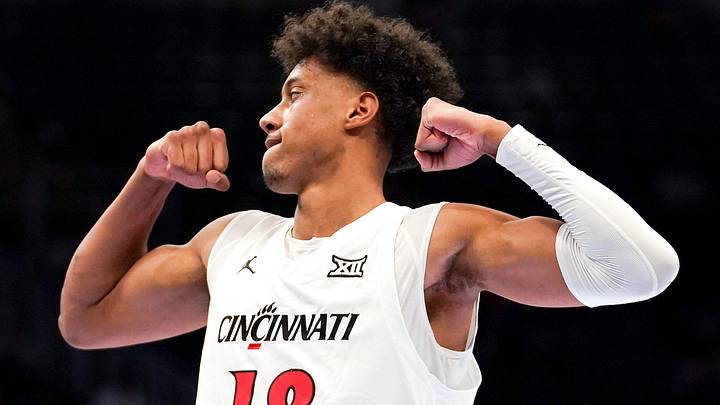 Cincinnati Bearcats forward Baba Miller (18) celebrates after completing a layup after being fouled in the first half of the Phillips 66 Big 12 Men’s Basketball Tournament between the Cincinnati Bearcats and Utah Utes, Tuesday, March 10, 2026, at T-Mobile Center in Kansas City, MO.