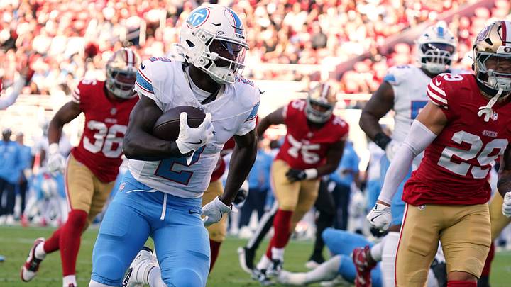 Aug 13, 2026; Santa Clara, California, USA;  Tennessee Titans running back Tyjae Spears (2) rushes the ball while pursued by San Francisco 49ers linebacker Nick Martin (45), safety Ashtyn Davis (29), and safety Marques Sigle (36) in the first quarter at Levi's Stadium. Mandatory Credit: David Gonzales-Imagn Images