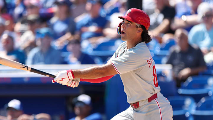Feb 26, 2025; Dunedin, Florida, USA; Philadelphia Phillies outfielder Gabriel Rincones Jr. (85) hits a solo home run against the Toronto Blue Jays in the third inning during spring training at TD Ballpark. 