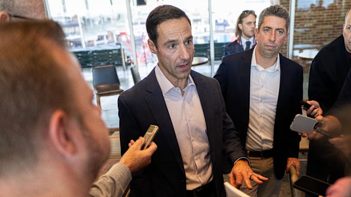 Nov 10, 2023; Cleveland, OH, USA;  Cleveland Guardians president of baseball operations Chris Antonetti, middle, talks to the media during an introductory press conference for new manager Stephen Vogt at Progressive Field. Mandatory Credit: Ken Blaze-Imagn Images