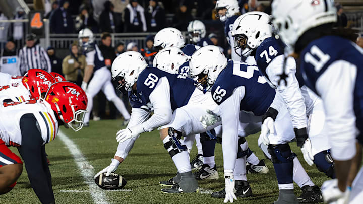 Penn State football offensive line before a snap against Maryland