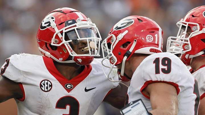 Oct 9, 2021; Auburn, Alabama, USA; Georgia Bulldogs running back Zamir White (3) celebrates with Georgia Bulldogs tight end Brock Bowers (19) after scoring a touchdown against the Auburn Tigers during the fourth quarter Jordan-Hare Stadium. Mandatory Credit: John Reed-USA TODAY Sports Oct 9, 2021; Auburn, Alabama, USA; Georgia Bulldogs running back Zamir White (3) celebrates with Georgia Bulldogs tight end Brock Bowers (19) after scoring a touchdown against the Auburn Tigers during the fourth quarter Jordan-Hare Stadium. Mandatory Credit: John Reed-USA TODAY Sports