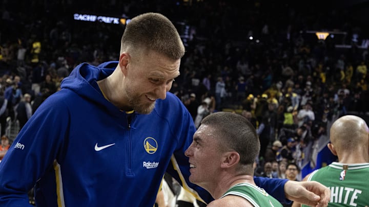 Feb 19, 2026; San Francisco, California, USA; Golden State Warriors center Kristaps Porzingis (left) shares a laugh with Boston Celtics guard Payton Pritchard (11) following their game at Chase Center. Mandatory Credit: D. Ross Cameron-Imagn Images Feb 19, 2026; San Francisco, California, USA; Golden State Warriors center Kristaps Porzingis (left) shares a laugh with Boston Celtics guard Payton Pritchard (11) following their game at Chase Center. Mandatory Credit: D. Ross Cameron-Imagn Images
