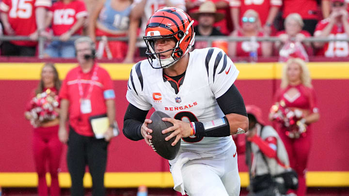 Sep 15, 2024; Kansas City, Missouri, USA; Cincinnati Bengals quarterback Joe Burrow (9) drops back to pass against the Kansas City Chiefs during the game at GEHA Field at Arrowhead Stadium. Mandatory Credit: Denny Medley-Imagn Images Sep 15, 2024; Kansas City, Missouri, USA; Cincinnati Bengals quarterback Joe Burrow (9) drops back to pass against the Kansas City Chiefs during the game at GEHA Field at Arrowhead Stadium. Mandatory Credit: Denny Medley-Imagn Images