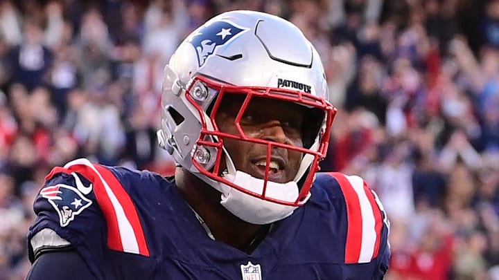 Nov 17, 2024; Foxborough, Massachusetts, USA;  New England Patriots offensive tackle Vederian Lowe (59) reacts to his touchdown against the Los Angeles Rams during the second half at Gillette Stadium. Mandatory Credit: Eric Canha-Imagn Images
