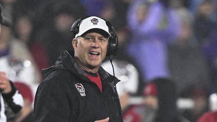 Dec 28, 2024; Annapolis, MD, USA; North Carolina State Wolfpack head coach Dave Doeren reacts after a play during the first half of the Go Bowling Military Bowl at Navy-Marine Corps Memorial Stadium. Mandatory Credit: Tommy Gilligan-Imagn Images Dec 28, 2024; Annapolis, MD, USA; North Carolina State Wolfpack head coach Dave Doeren reacts after a play during the first half of the Go Bowling Military Bowl at Navy-Marine Corps Memorial Stadium. Mandatory Credit: Tommy Gilligan-Imagn Images