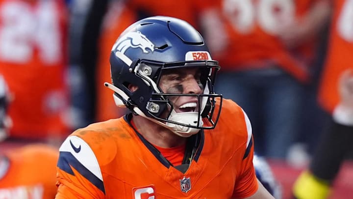 Oct 19, 2025; Denver, Colorado, USA; Denver Broncos quarterback Bo Nix (10) celebrates after play during the second half against the New York Giants at Empower Field at Mile High. Mandatory Credit: Ron Chenoy-Imagn Images