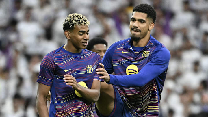 Lamine Yamal (left) and Ronald Araujo (right) were both doubts for the game.