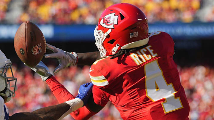 Nov 23, 2025; Kansas City, Missouri, USA;  Kansas City Chiefs wide receiver Rashee Rice (4) cannot make a catch against Indianapolis Colts cornerback Sauce Gardner (1) in the first half at GEHA Field at Arrowhead Stadium. Mandatory Credit: Jay Biggerstaff-Imagn Images