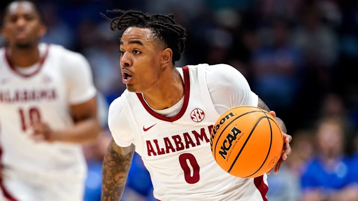 Alabama guard Labaron Philon (0) runs the ball up the court against Kentucky during the second half of a Southeastern Conference tournament quarterfinal game at Bridgestone Arena in Nashville, Tenn., Friday, March 14, 2025.