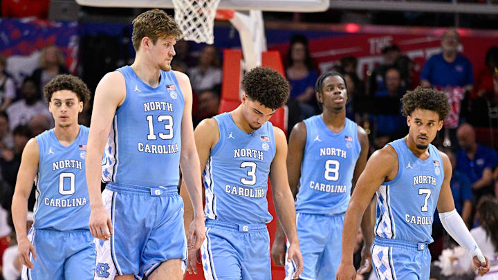 Jan 3, 2026; Dallas, Texas, USA; North Carolina Tar Heels guard Kyan Evans (0) and center Henri Veesaar (13) and guard Derek Dixon (3) and forward Caleb Wilson (8) and guard Seth Trimble (7) come back on the court during the second half against the SMU Mustangs at Moody Coliseum. Mandatory Credit: Jerome Miron-Imagn Images