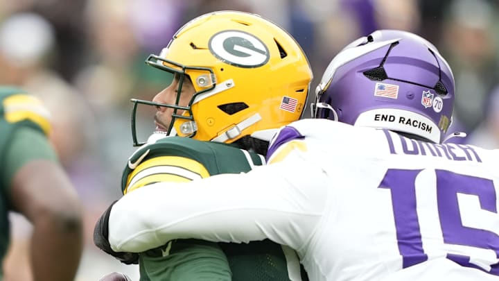 Green Bay Packers quarterback Jordan Love (10) is sacked by Minnesota Vikings linebacker Dallas Turner on Sunday.