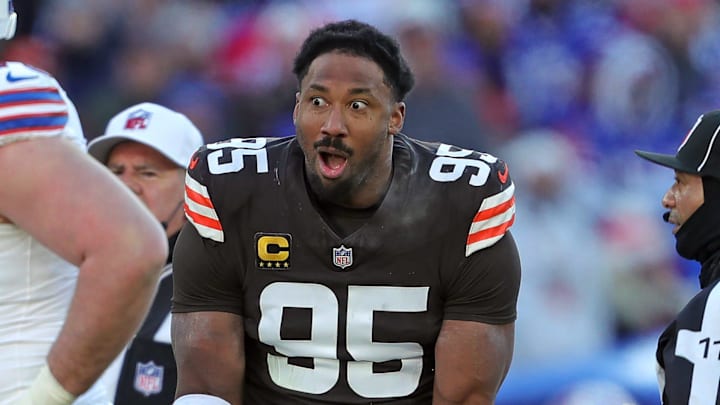 Cleveland Browns defensive end Myles Garrett (95) reacts after losing his helmet on a play during the second half of an NFL football game at Huntington Bank Field, Dec. 21, 2025, in Cleveland, Ohio.