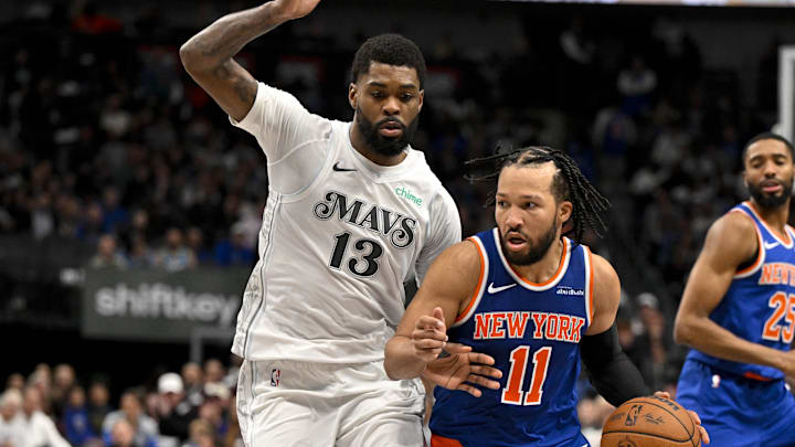 Nov 27, 2024; Dallas, Texas, USA; Dallas Mavericks forward Naji Marshall (13) and New York Knicks guard Jalen Brunson (11) in action during the game between the Dallas Mavericks and the New York Knicks at the American Airlines Center. Mandatory Credit: Jerome Miron-Imagn Images