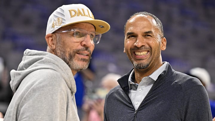 Oct 6, 2025; Fort Worth, Texas, USA; Dallas Mavericks head coach Jason Kidd (left) and general manager Nico Harrison (right) look on before the game against the Oklahoma City Thunder at Dickie's Arena. Mandatory Credit: Jerome Miron-Imagn Images