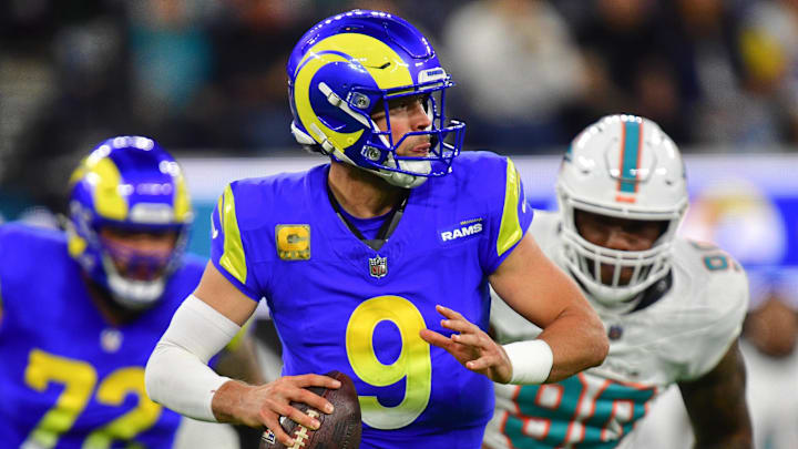 Nov 11, 2024; Inglewood, California, USA; Los Angeles Rams quarterback Matthew Stafford (9) moves out to pass against the Miami Dolphins during the first half at SoFi Stadium. Mandatory Credit: Gary A. Vasquez-Imagn Images