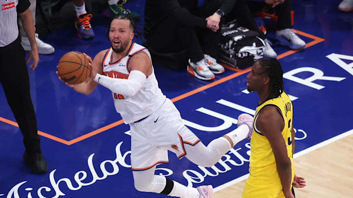 New York Knicks guard Jalen Brunson (11) controls the ball against Indiana Pacers forward Aaron Nesmith (23) in the third quarter during game one of the eastern conference finals for the 2025 NBA Playoffs at Madison Square Garden.