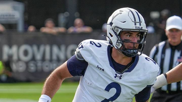 Yale quarterback Dante Reno led the Bulldogs to victory just a day after his father's passing. 