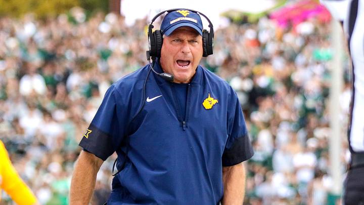 Sep 6, 2025; Athens, Ohio, USA; West Virginia Mountaineers head coach Rich Rodriguez calls a timeout during the second quarter against the Ohio Bobcats at Peden Stadium. Mandatory Credit: Ben Queen-Imagn Images Sep 6, 2025; Athens, Ohio, USA; West Virginia Mountaineers head coach Rich Rodriguez calls a timeout during the second quarter against the Ohio Bobcats at Peden Stadium. Mandatory Credit: Ben Queen-Imagn Images