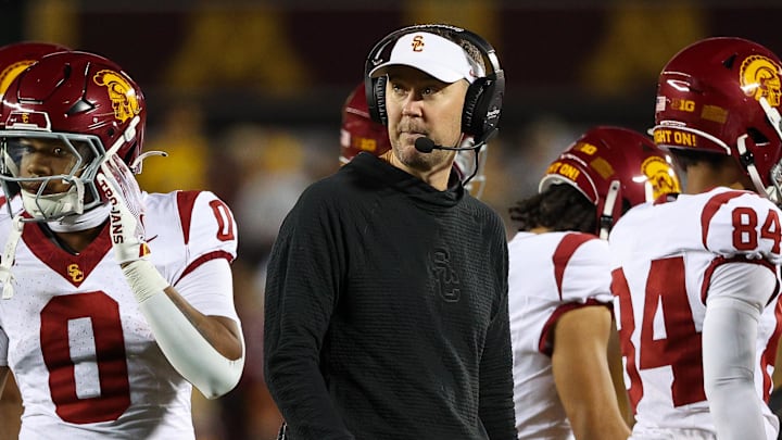 Oct 5, 2024; Minneapolis, Minnesota, USA; USC Trojans head coach Lincoln Riley looks on during the first half against the Minnesota Golden Gophers at Huntington Bank Stadium.