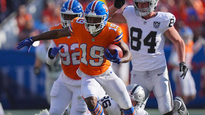 Oct 6, 2024; Denver, Colorado, USA; Denver Broncos wide receiver Marvin Mims Jr. (19) during a kickoff return in the second half against the Las Vegas Raiders at Empower Field at Mile High. 
