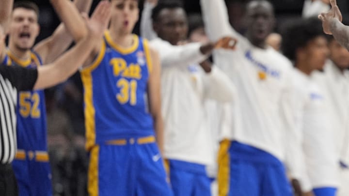 Mar 11, 2025; Charlotte, NC, USA; Pittsburgh Panthers forward Zack Austin (55) reacts to his bench after a three point field goal against the Notre Dame Fighting Irish during the second half at Spectrum Center. Mandatory Credit: Jim Dedmon-Imagn Images Mar 11, 2025; Charlotte, NC, USA; Pittsburgh Panthers forward Zack Austin (55) reacts to his bench after a three point field goal against the Notre Dame Fighting Irish during the second half at Spectrum Center. Mandatory Credit: Jim Dedmon-Imagn Images