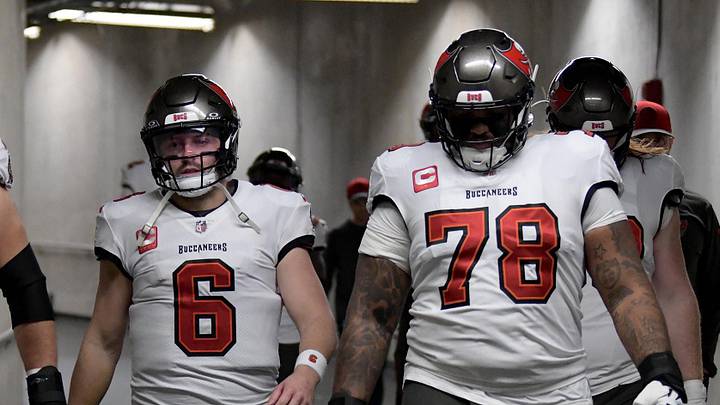 Quarterback Baker Mayfield (6), offensive tackle Tristan Wirfs (78)