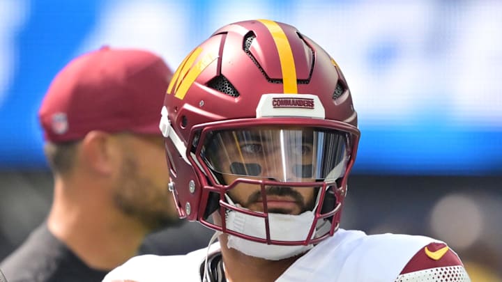 Washington Commanders quarterback Marcus Mariota warms up before the game against the Los Angeles Chargers. Washington Commanders quarterback Marcus Mariota warms up before the game against the Los Angeles Chargers.