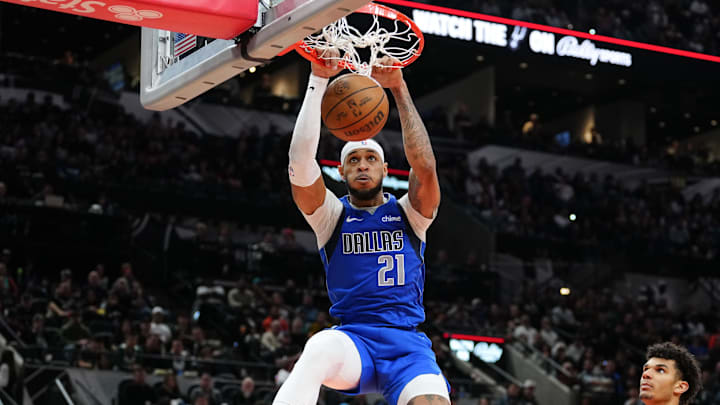 Mar 19, 2024; San Antonio, Texas, USA;  Dallas Mavericks center Daniel Gafford (21) dunks the ball in the second half against the San Antonio Spurs at Frost Bank Center. Mandatory Credit: Daniel Dunn-Imagn Images