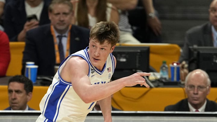 Apr 5, 2025; San Antonio, TX, USA; Duke Blue Devils guard Kon Knueppel (7) reacts after a play against the Houston Cougars during the first half in the semifinals of the men's Final Four of the 2025 NCAA Tournament at Alamodome. Mandatory Credit: Scott Wachter-Imagn Images
Apr 5, 2025; San Antonio, TX, USA; Duke Blue Devils guard Kon Knueppel (7) reacts after a play against the Houston Cougars during the first half in the semifinals of the men's Final Four of the 2025 NCAA Tournament at Alamodome. Mandatory Credit: Scott Wachter-Imagn Images