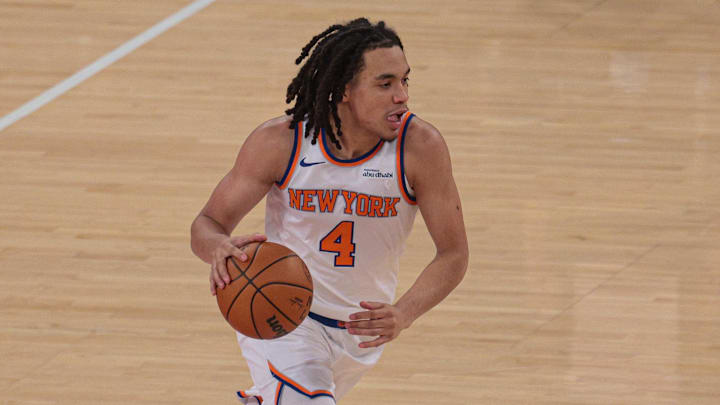 Oct 13, 2025; New York, New York, USA; New York Knicks forward Pacome Dadiet (4) dribbles up court against the Washington Wizards during the first quarter at Madison Square Garden. Mandatory Credit: Vincent Carchietta-Imagn Images