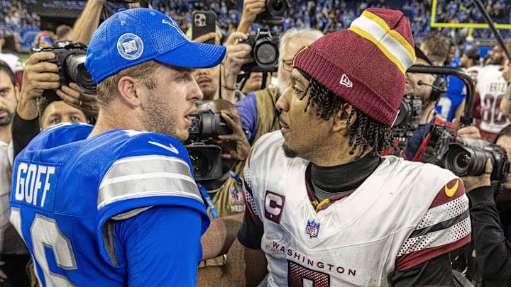 Detroit Lions quarterback Jared Goff (16) congratulates Washington Commanders quarterback Jayden Daniels (5) 