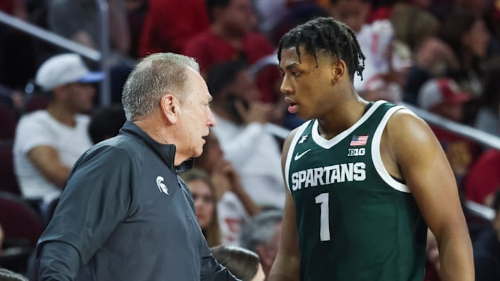Feb 1, 2025; Los Angeles, California, USA;  Michigan State Head Coach Tom Izzo talks to  guard Jeremy Fears Jr. (1) on the sideline during the first half against the USC Trojans at Galen Center. Mandatory Credit: William Navarro-Imagn Images