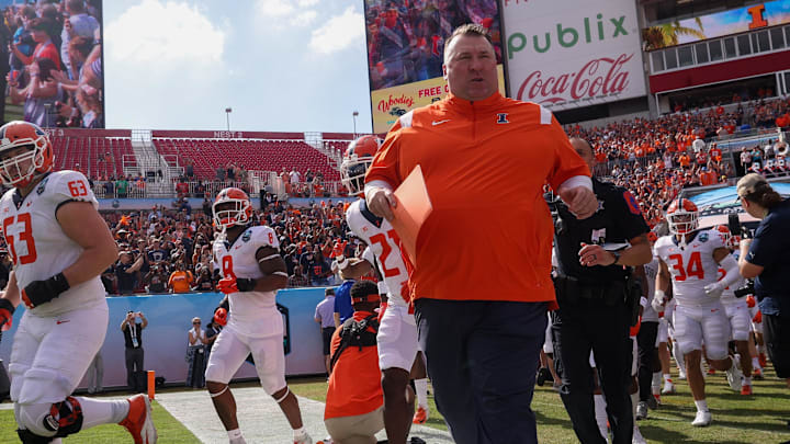 Jan 2, 2023; Tampa, FL, USA; Illinois Fighting Illini head coach Bret Bielema takes the field fro the  the 2023 ReliaQuest Bowl against the Mississippi State Bulldogs  at Raymond James Stadium. Mandatory Credit: Nathan Ray Seebeck-Imagn Images