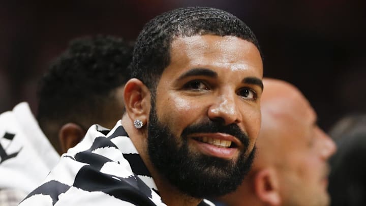 Jan 14, 2022; Miami, Florida, USA; Canadian rapper Drake attends the game between the Miami Heat and the Atlanta Hawks at FTX Arena. Mandatory Credit: Sam Navarro-Imagn Images
